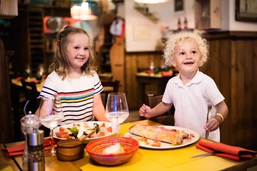 kids sitting down to eat