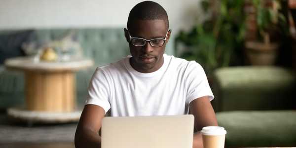 man using laptop