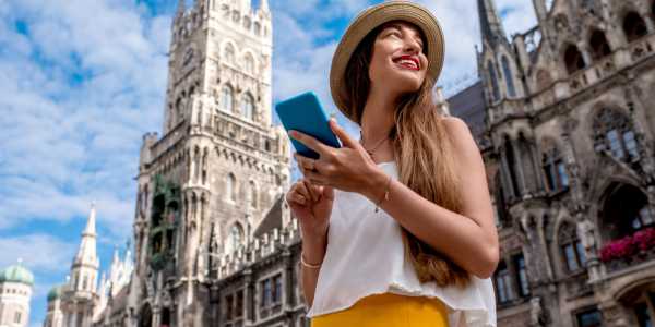 woman looking around while smiling