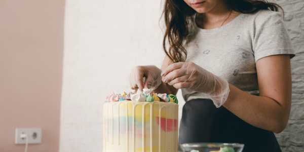 woman decorating cake