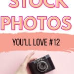 hand holding camera with pink background