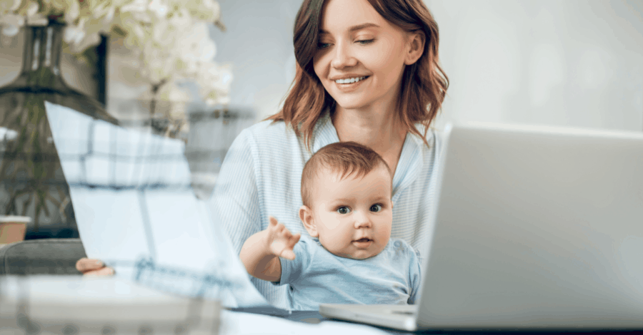 mom with baby doing chat job at home