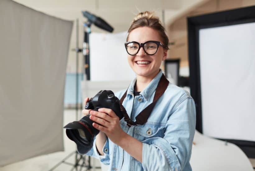 female photographer smiling
