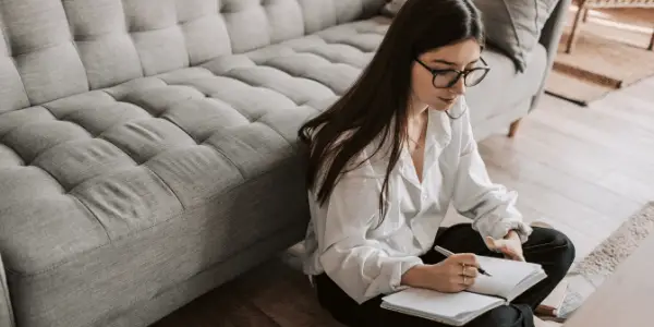 woman sitting on floor