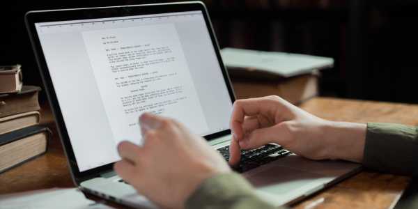 writer using laptop